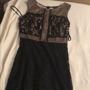 Nude and black dress